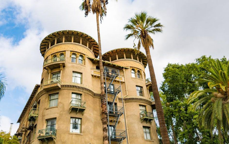 Castle Green, a tall building with palm trees
